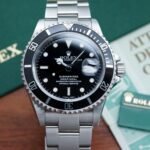 histoire de Rolex Submariner 16610LN avec lunette noire et bracelet Oyster